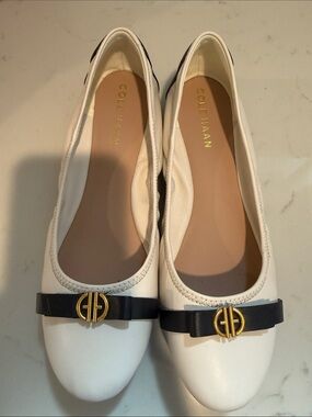 Cole Haan White Leather Ballet Flats with Black Bow and Gold Accent